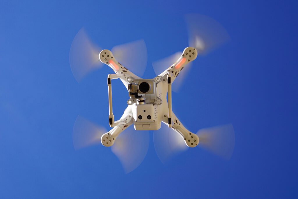 A DJI drone flying in the sky